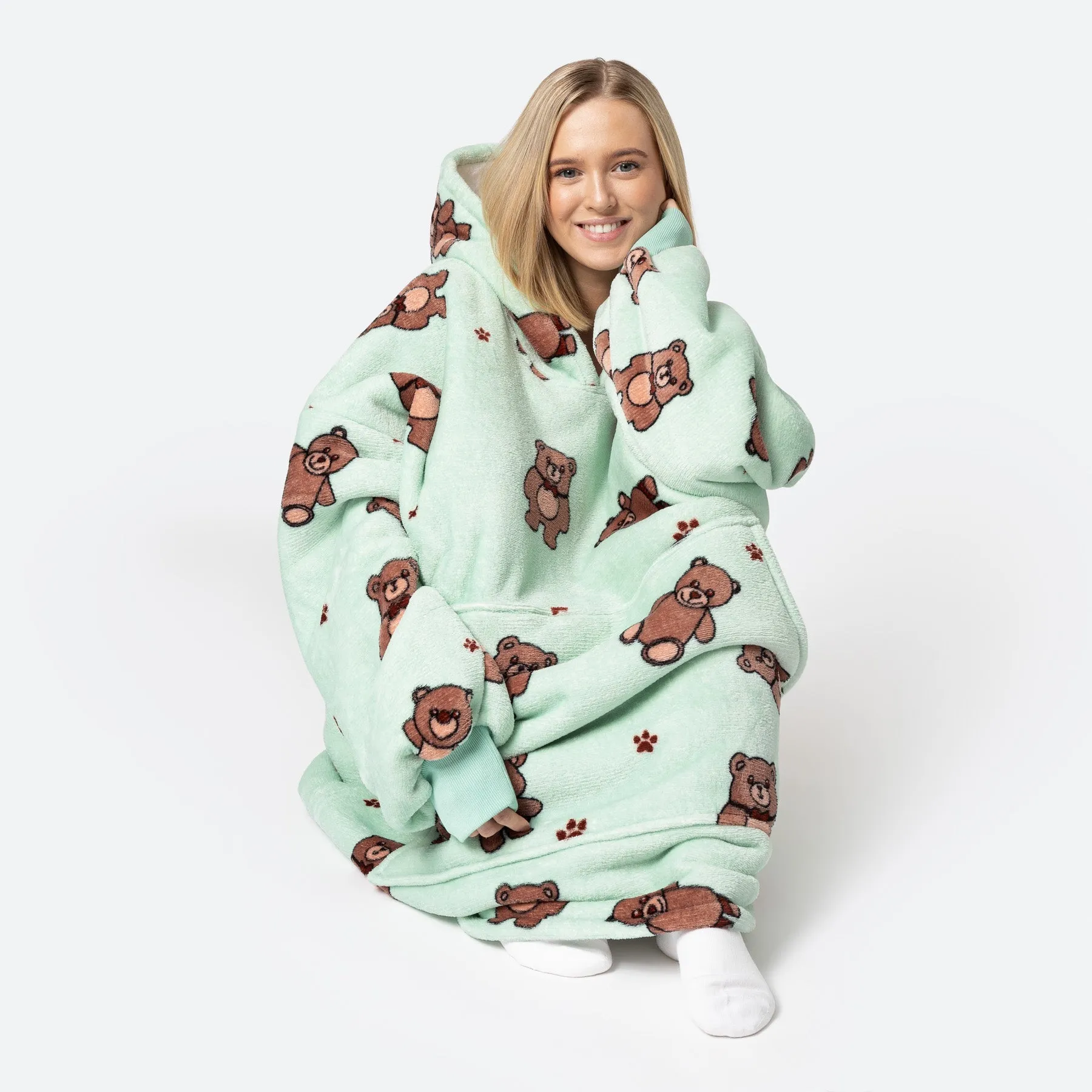 Certainly! To optimize the title of this e-commerce product for better visibility and appeal, you could use a structured format with relevant modifiers. Heres a suggestion:

Cozy Teddybear HappyHoodie with Adjustable Hood – Perfect Gift for Kids & Adults